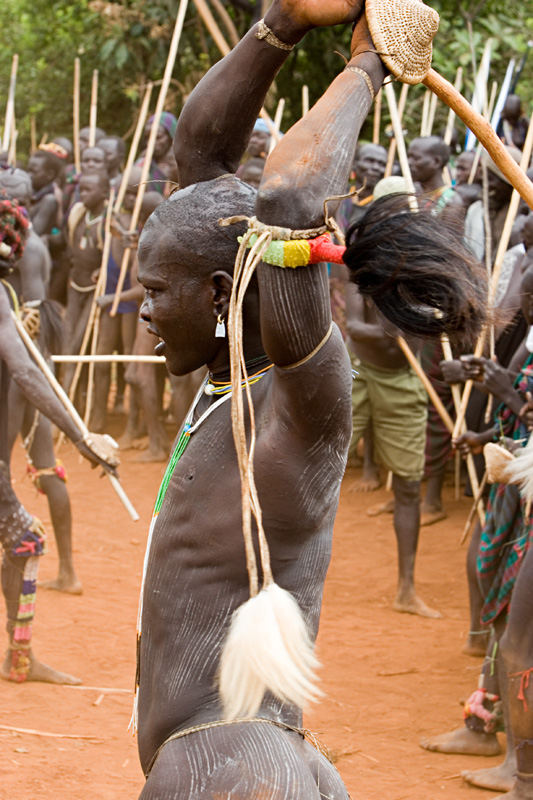 112   Surma warrior at donga stick fighting